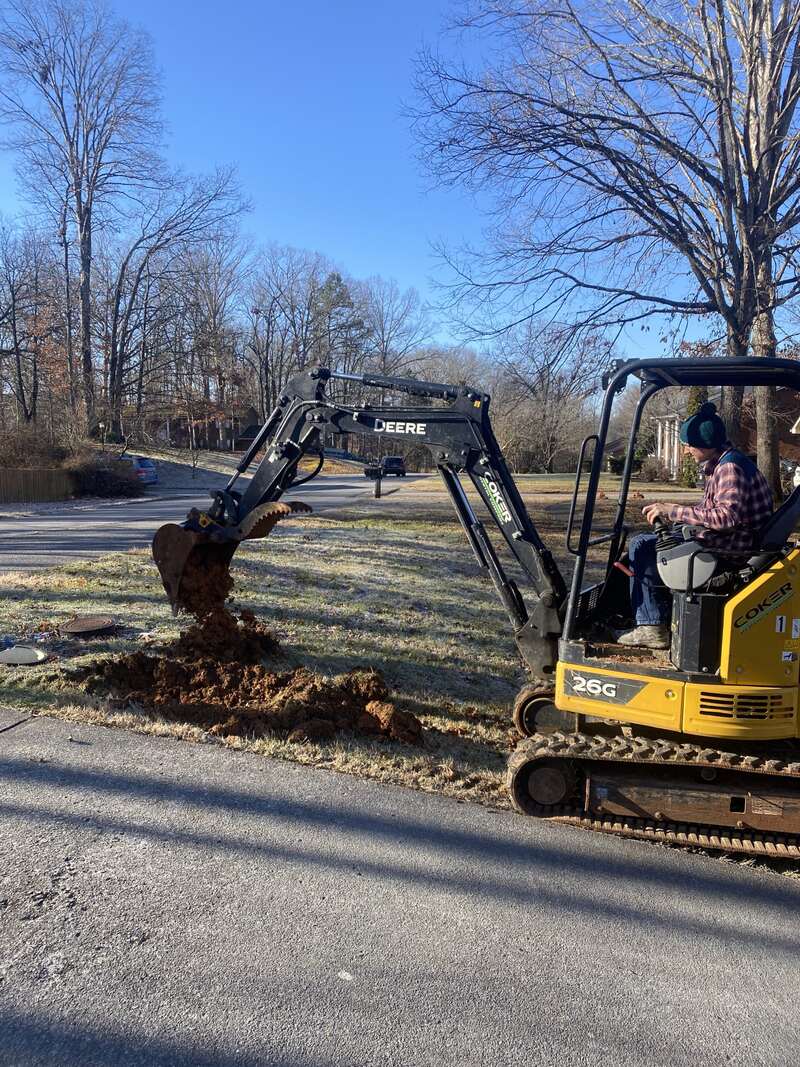 Sewer line excavation and pipe repair